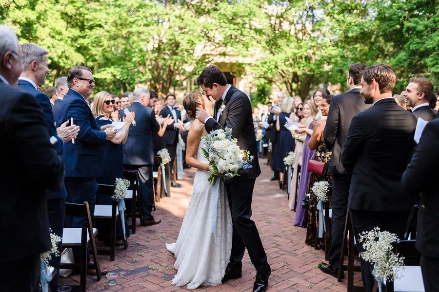 Recessional down the aisle at an outdoor Savannah wedding